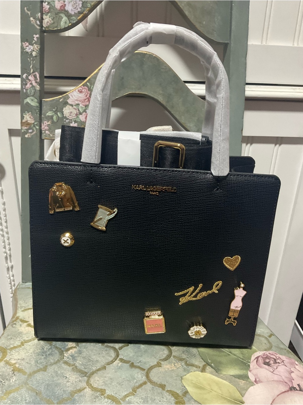 Karl Lagerfeld Black Satchel with Gold Hardware and Enamel Pin Accents